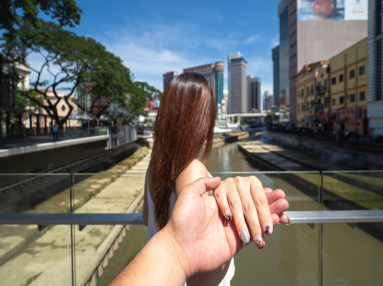 girl's held hand